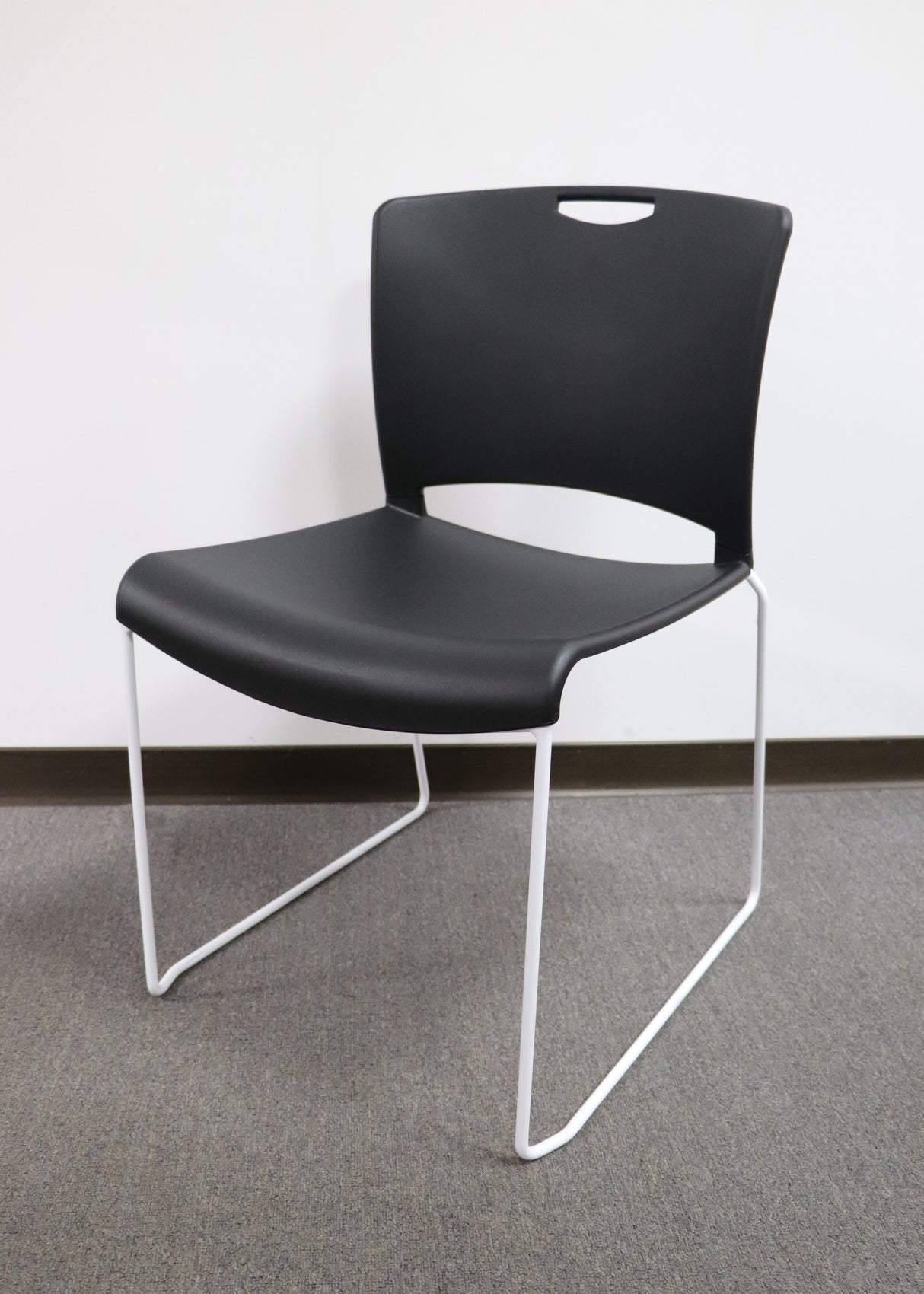 white frame visitor chair